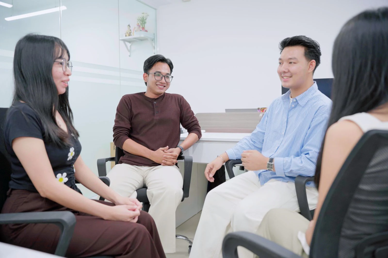 Saturday Education counsellors having a discussion in the office